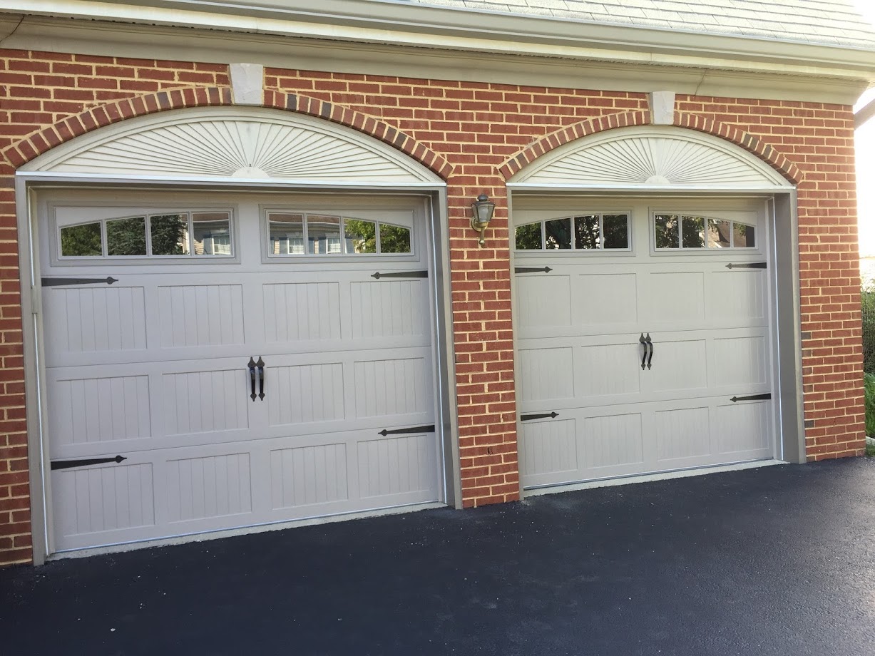 CHOOSE YOUR WINDOWS A modern black garage door in Chicago