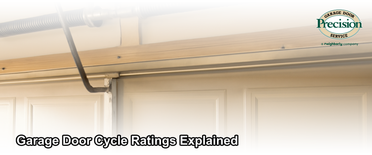 Close-up of a residential garage door spring and hardware system in a New Jersey home garage, illustrating cycle wear and mechanical components