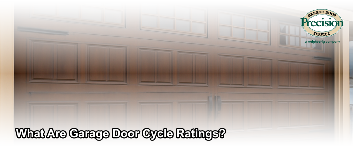 Close-up of a residential garage door panel showing quality construction detail, with a suburban New Jersey home in the background