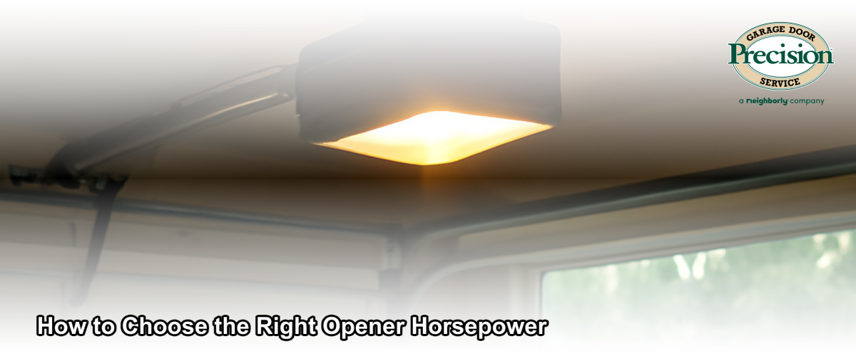 Close-up of a residential garage door opener motor unit mounted on a ceiling track in a suburban New Jersey home garage