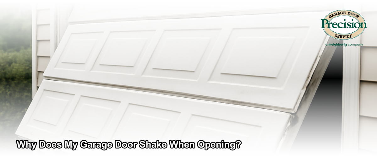 A residential garage door on a home in Brick, NJ vibrating or shaking during operation, showing worn rollers and tracks