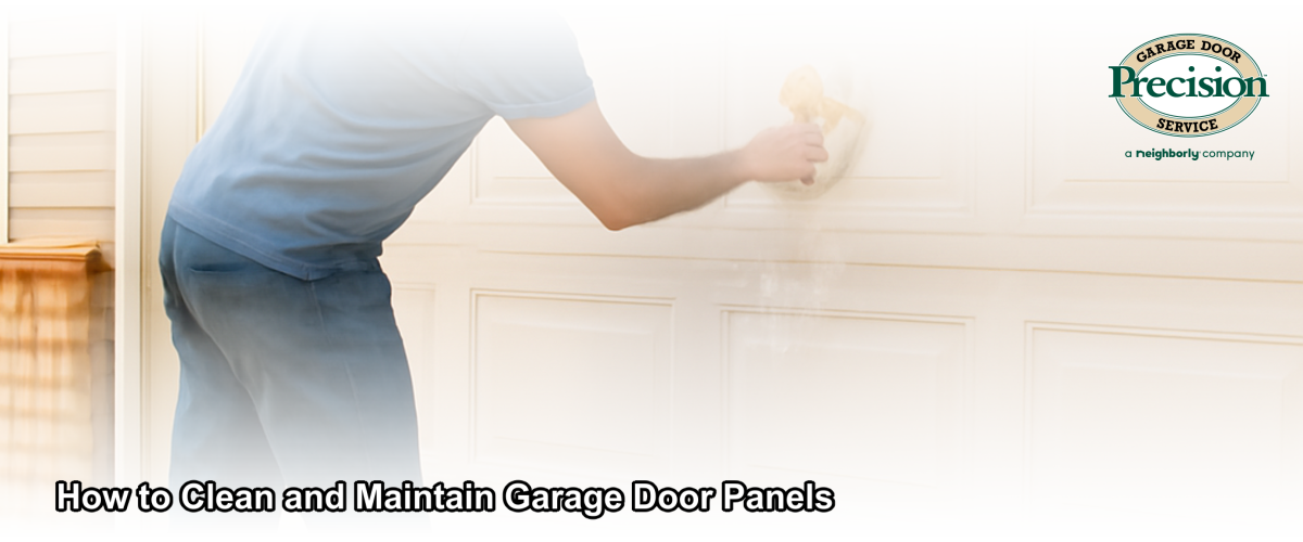 Homeowner cleaning and maintaining garage door panels on a residential home in Central New Jersey